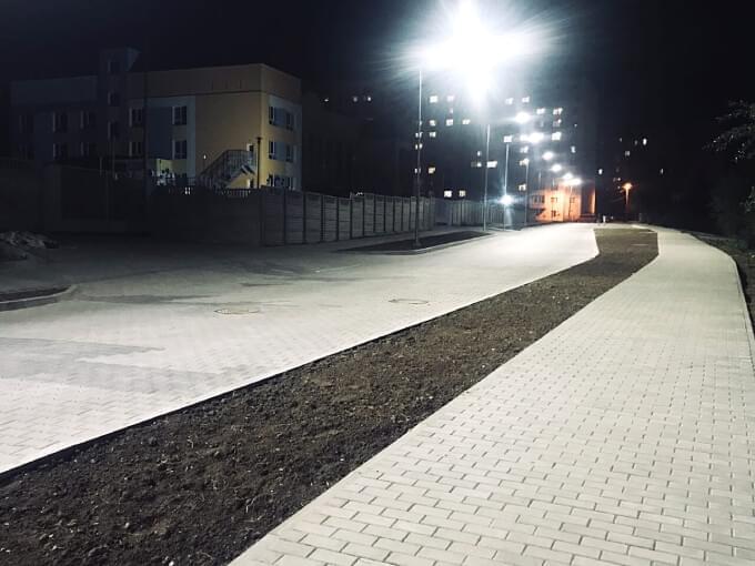 the night road is paved with FEM cobblestones and new streetlights